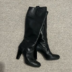 TOD’S black leather boots. Excellent condition. Heel with slight platform.